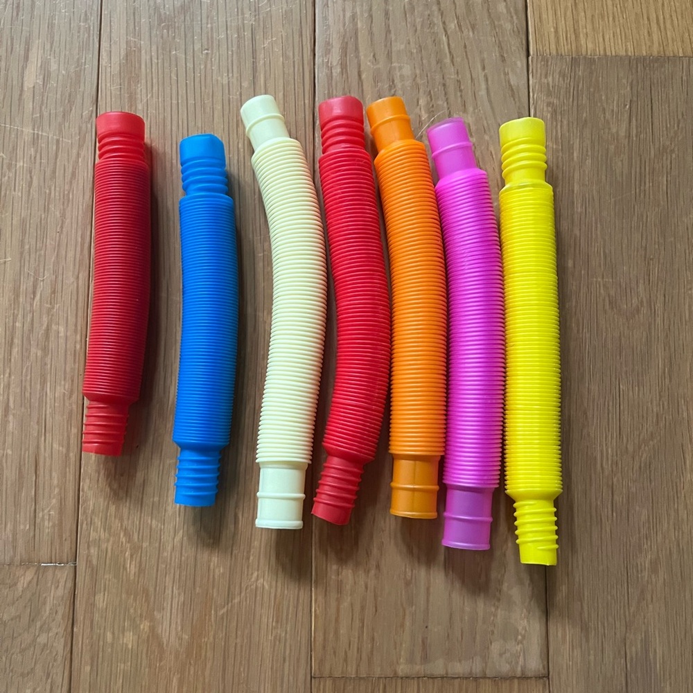 Lot of 7 Pull and Pop Fidget Tubes Colorful Assortment Childrens Toy